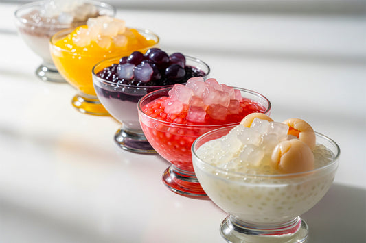 Five sago dessert bowls with Jubes nata de coco in original, lychee, mango, strawberry, and grape flavors.