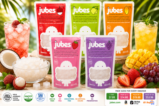 Jubes nata de coco coconut jelly pouches in five flavors displayed with fresh fruit, coconut jelly cubes, and iced drinks in a tropical summer setting.