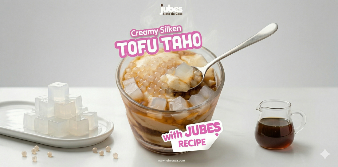 Bowl of glass of silken tofu taho but topped with Jubes Nata de Coco
