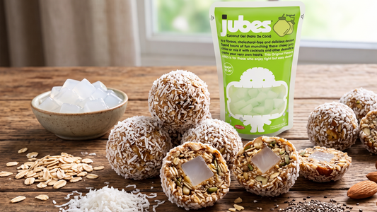 no-bake coconut energy bites made with oats and shredded coconut, filled with colorful Jubes nata de coco coconut jelly cubes, with Jubes pouches displayed