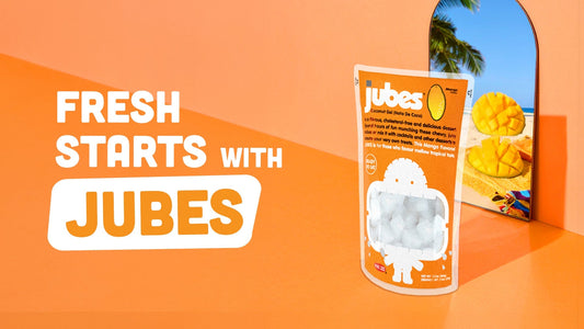 Orange Jubes nata de coco pouch with mango flavor shown against a bright orange backdrop and summer theme.